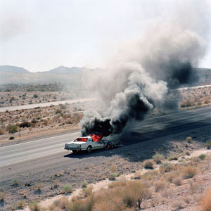 Jeff Brouws's Burning Car, Needles, California (Robert Mann gallery, 1995)